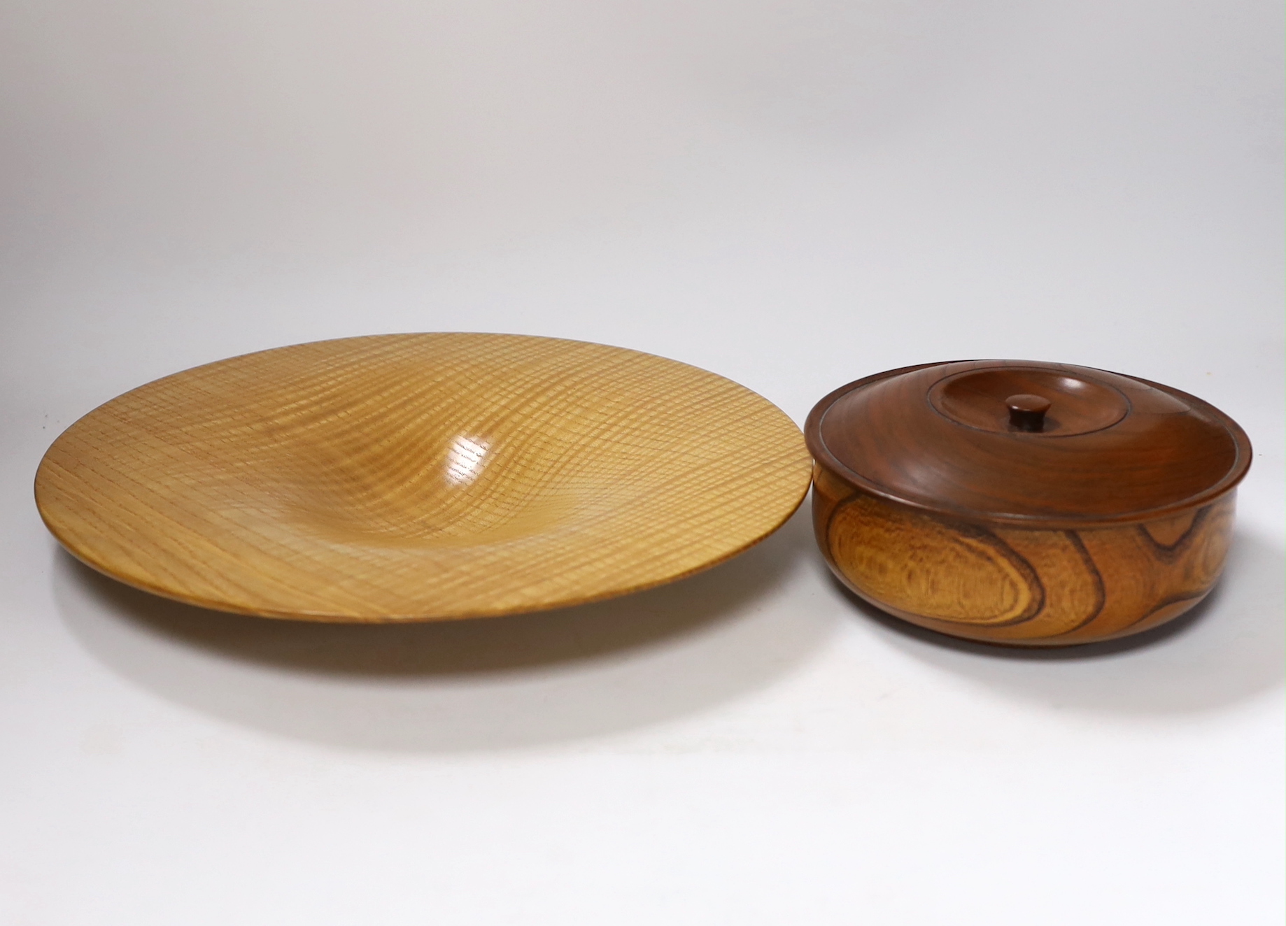 A contemporary Sussex Ash bowl, together with an elm bowl and cover, largest 32cm diameter